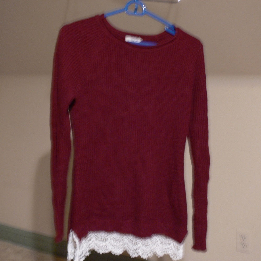 Sweater with lace at bottom